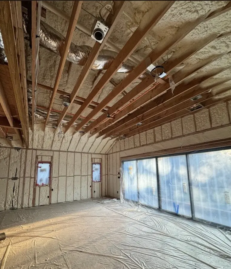 Interior walls and ceiling insulated with spray foam during new construction in Lincoln City
